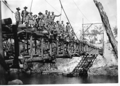 1944-3-Sect-building-a-suspension-bridge-in-Jacquinot-Bay-area